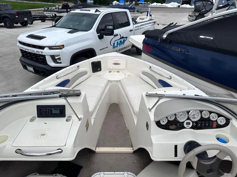 Slide: The Image of 2005 Stingray 195 FX Ski & Fish boat interior with dashboard and seating. - 5