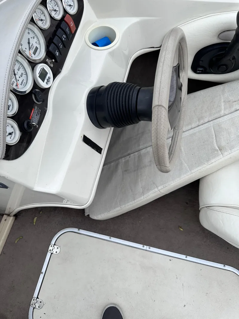 Slide: The Image of 2005 Stingray 195 FX Ski & Fish boat dashboard and steering wheel. - 7