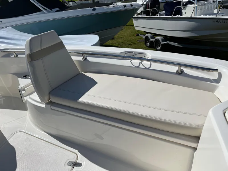 Slide: The Image of 2025 Boston Whaler 280 Dauntless boat with sleek seating and modern design. - 10