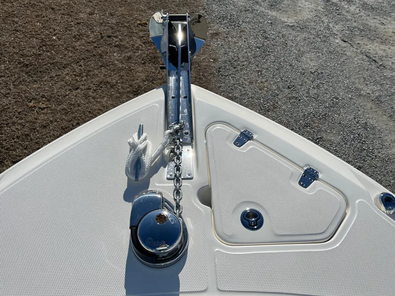 Slide: The Image of Bow of 2025 Boston Whaler 250 Outrage with anchor and chain detail. - 24