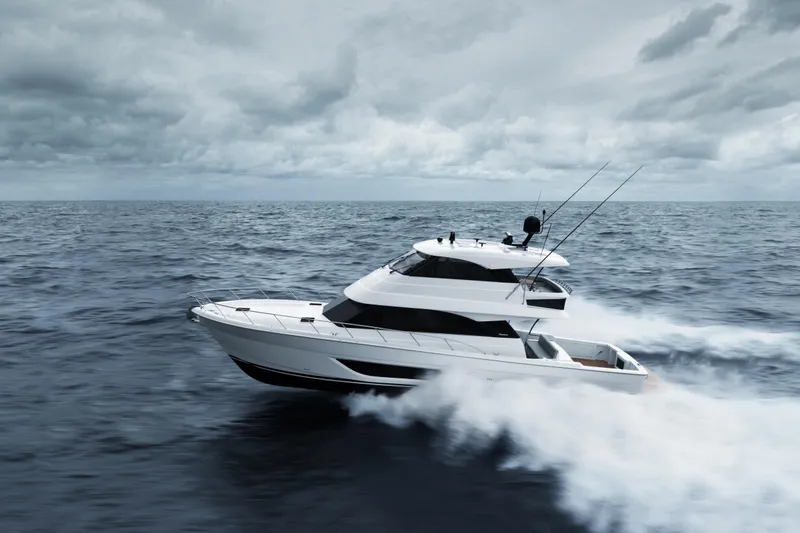 The Image of 2026 Maritimo M600 yacht cruising on open sea under cloudy skies. - 0