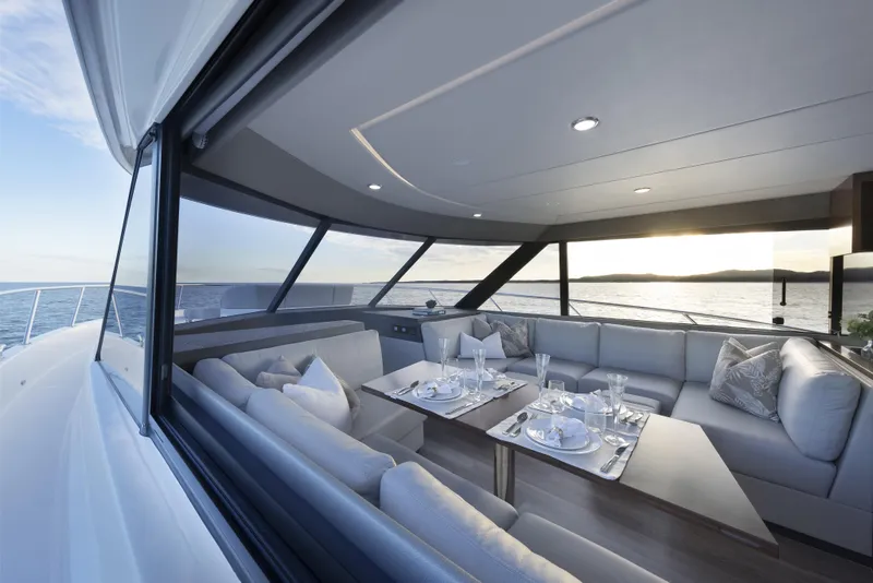 Slide: The Image of Luxurious interior of 2026 Maritimo M600 yacht with elegant dining setup. - 10