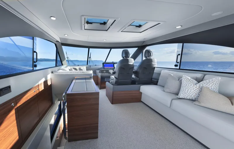 Slide: The Image of Luxurious interior of 2026 Maritimo M600 yacht with modern seating and ocean view. - 11