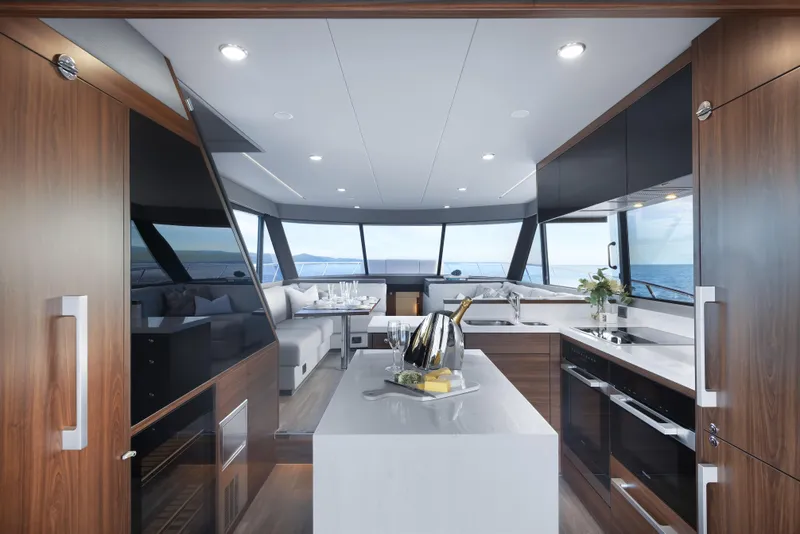 Slide: The Image of Luxurious interior of 2026 Maritimo M600 yacht with modern kitchen and ocean view. - 8