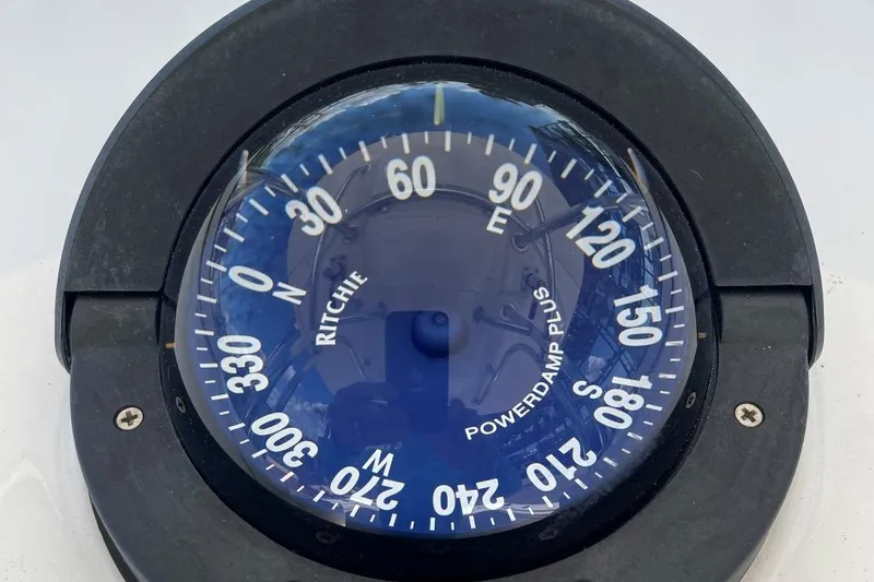 Slide: The Image of Close-up of a Ritchie Powerdamp Plus compass on a 2017 Regulator R23 boat. - 26