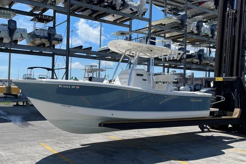 Slide: The Image of 2017 Regulator R23 boat in storage facility. - 4
