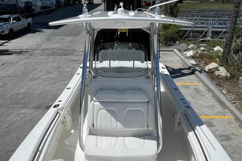 Slide: The Image of 2017 Regulator R23 boat with T-top and seating. - 8