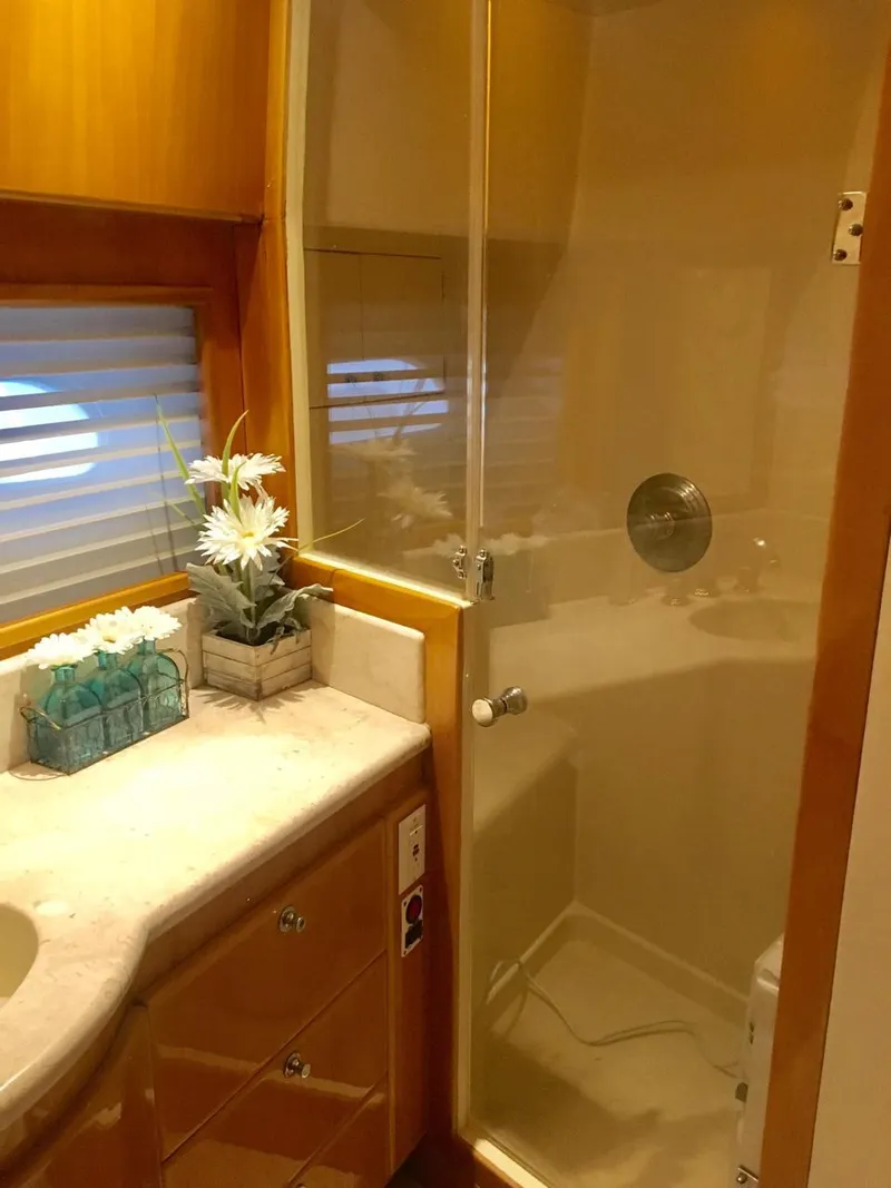 Slide: The Image of Luxurious bathroom in 2004 McKinna 58 yacht with shower and elegant decor. - 10