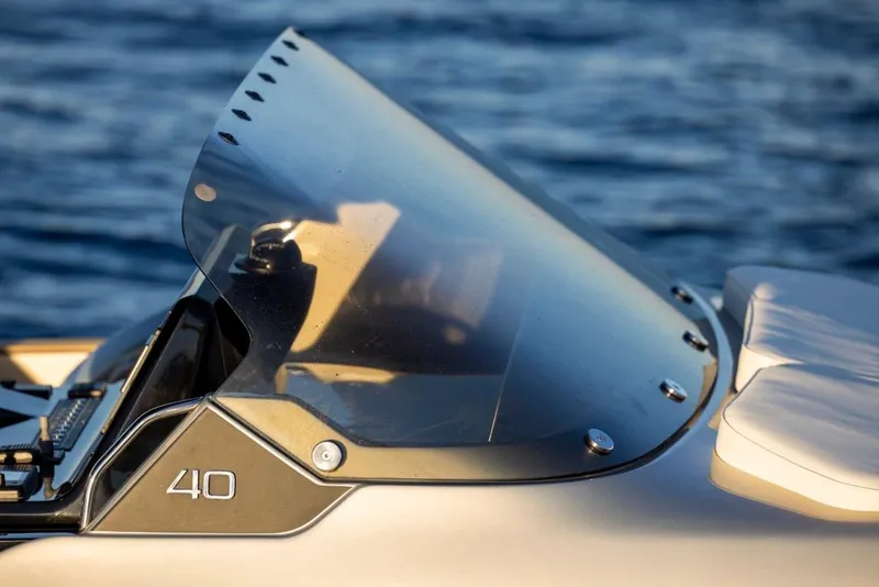 Slide: The Image of Close-up of 2024 Solaris Power 40 Open boat windshield and logo. - 12