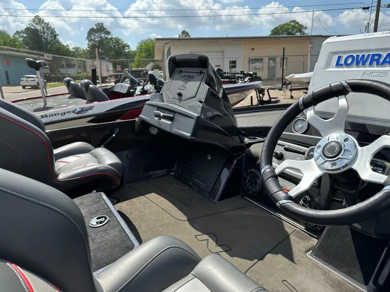 Slide: The Image of Interior of a 2022 Nitro Z20 Pro boat with steering wheel and seating. - 17