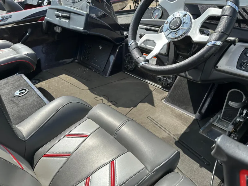 Slide: The Image of Interior of a 2022 Nitro Z20 Pro boat showing steering wheel and seats. - 19
