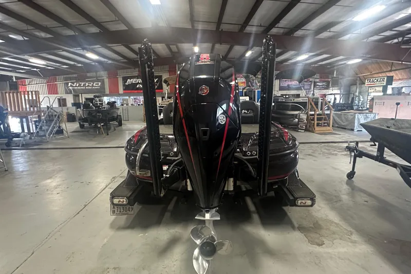 Slide: The Image of Nitro Z20 Pro 2022 boat in showroom, showcasing powerful engine and sleek design. - 29