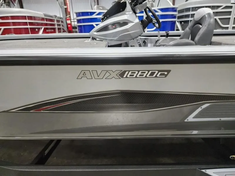 Slide: The Image of 2024 Vexus AVX1880 boat side view in showroom. - 3
