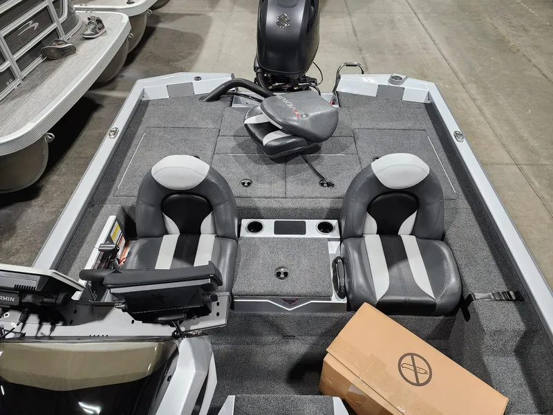 Slide: The Image of 2024 Vexus AVX1880 fishing boat interior with dual seats and motor. - 8