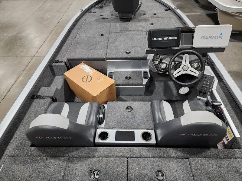 Slide: The Image of 2024 Vexus AVX1880 boat interior with Humminbird and Garmin electronics. - 9