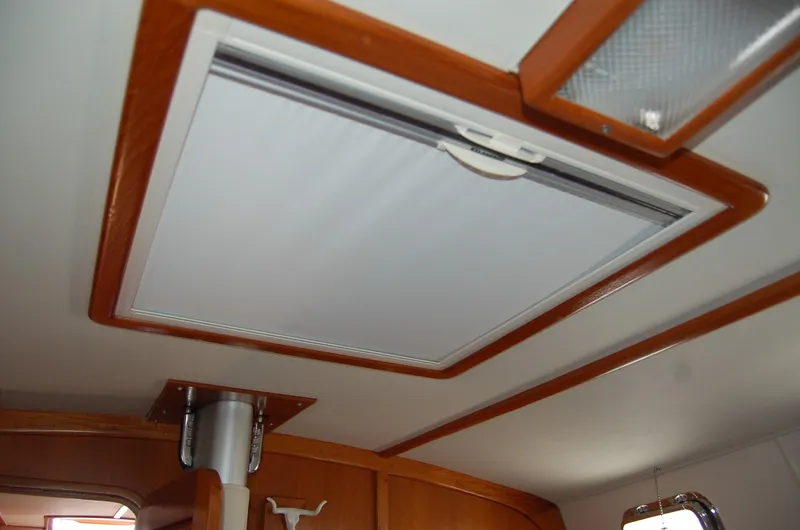 Slide: The Image of Sun and screen shades on hatch - 115