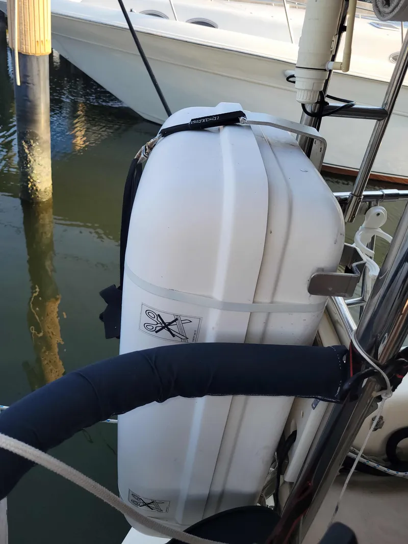 Slide: The Image of White life raft container on a 2005 Caliber 40 LRC SE sailboat. - 30