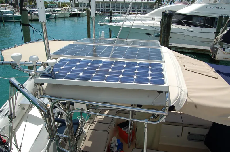 Slide: The Image of Solar panels on a 2005 Caliber 40 LRC SE yacht in a marina. - 32