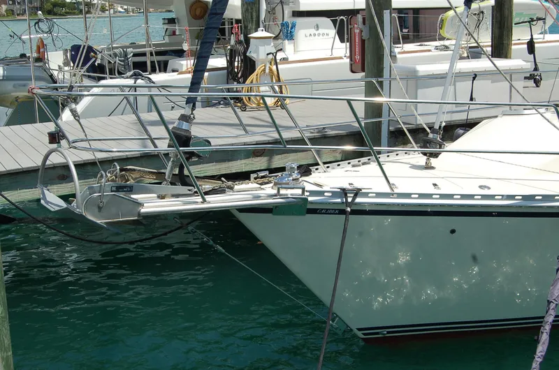 Slide: The Image of 2005 Caliber 40 LRC SE sailboat docked at marina, featuring sleek design and sturdy build. - 4