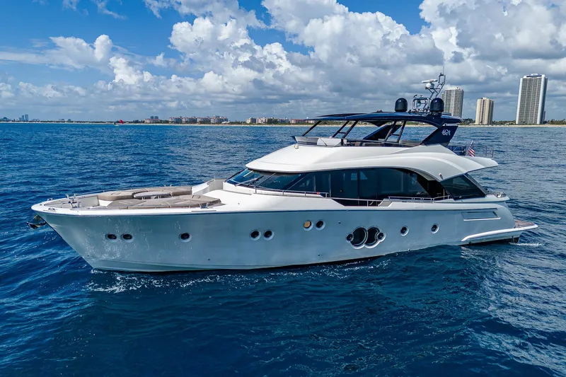 Slide: The Image of 2017 Monte Carlo Yachts MCY 80 Flybridge cruising on the ocean. - 0