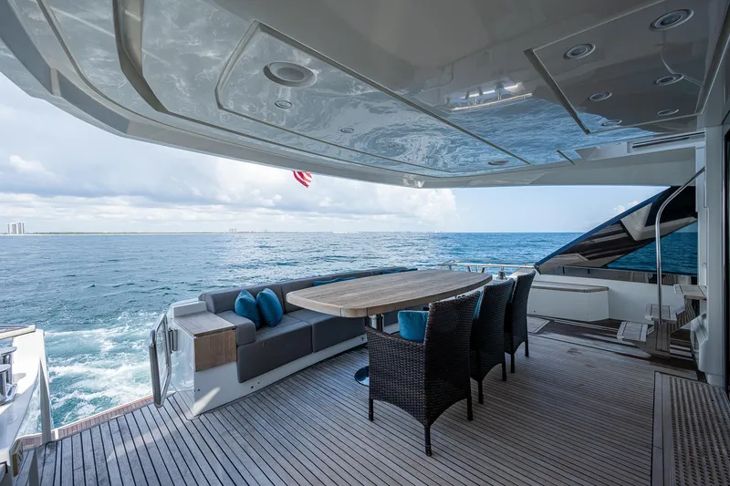 Slide: The Image of Luxury outdoor seating on 2017 Monte Carlo Yachts MCY 80 Flybridge, ocean view. - 20