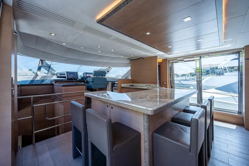 Slide: The Image of Luxurious interior of 2017 Monte Carlo Yachts MCY 80 Flybridge with modern dining area. - 40