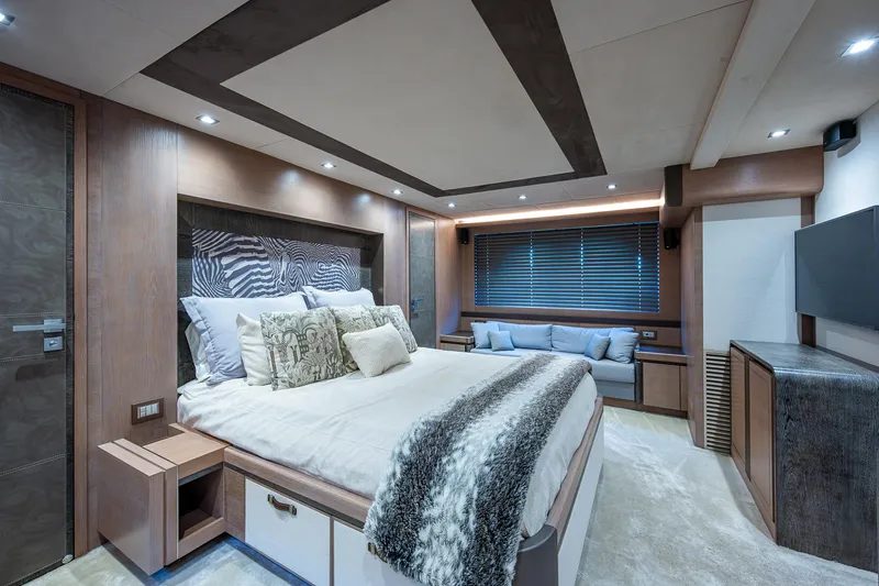 Slide: The Image of Luxurious master bedroom on the 2017 Monte Carlo Yachts MCY 80 Flybridge. - 44