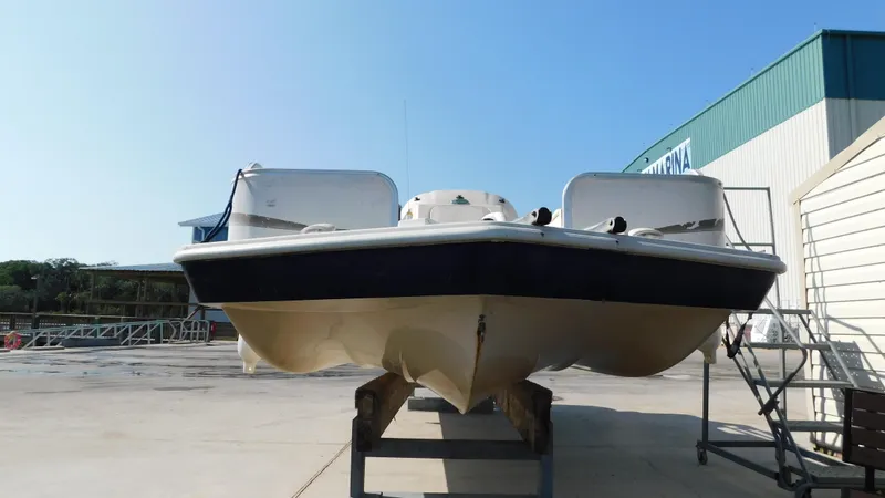 Slide: The Image of 2006 Hurricane 22 Deck Boat on dry dock, front view. - 3