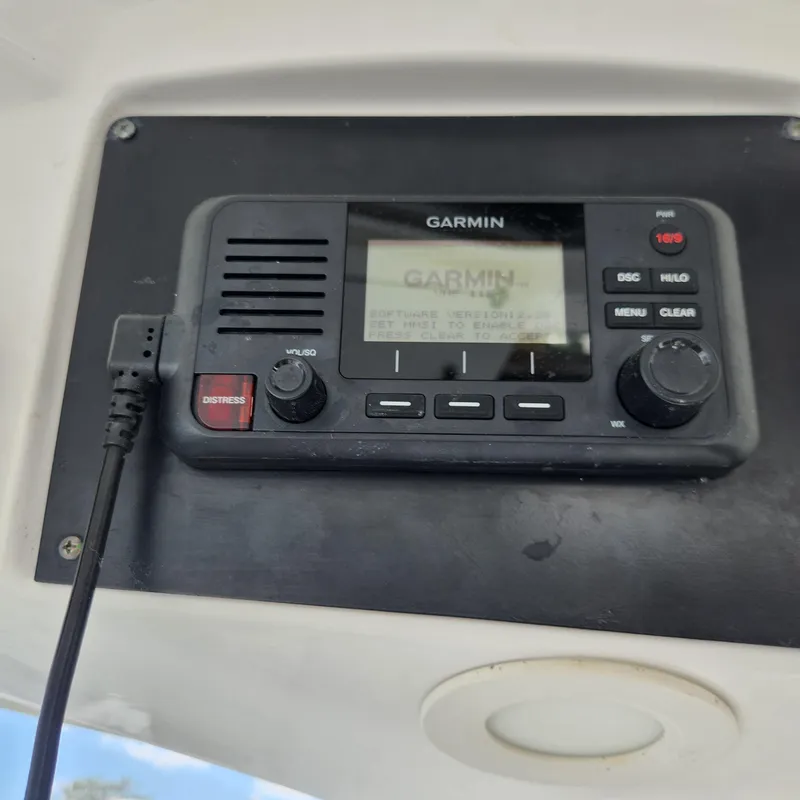 Slide: The Image of Garmin marine radio on 2020 Sea Fox 328 Commander boat dashboard. - 22