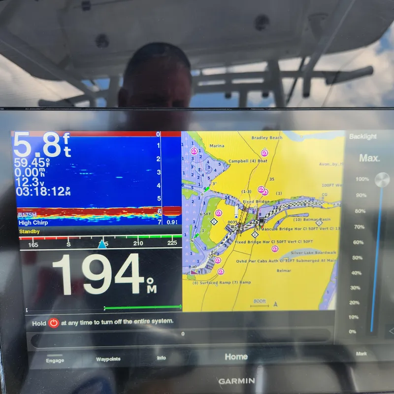 Slide: The Image of Garmin navigation and sonar display on a 2020 Sea Fox 328 Commander boat. - 26