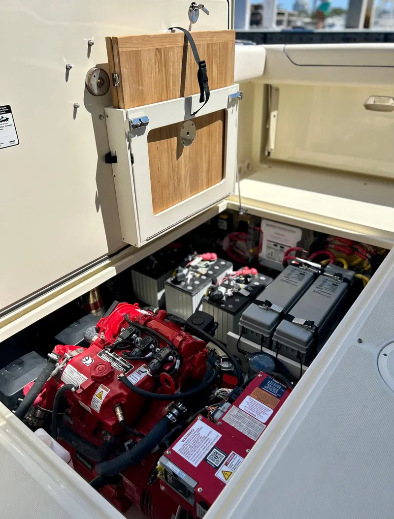 Slide: The Image of Engine compartment of a 2023 Chris-Craft 35 CALYPSO boat. - 16