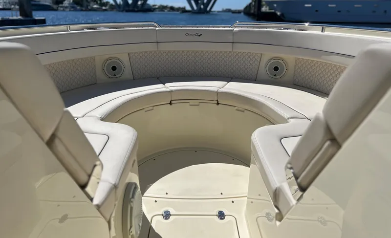 Slide: The Image of 2023 Chris-Craft 35 CALYPSO boat interior with circular seating and speakers. - 5