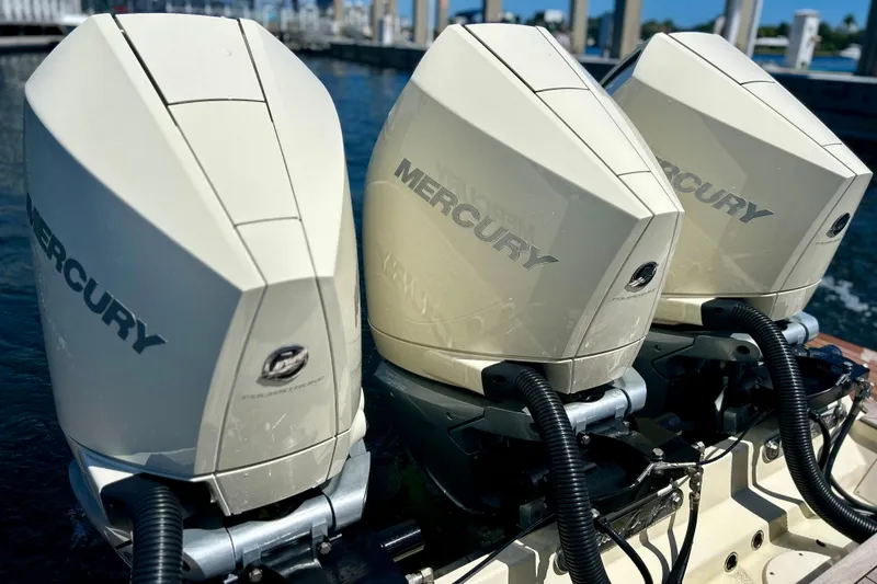 Slide: The Image of Triple Mercury outboard engines on 2023 Chris-Craft 35 Calypso boat. - 6