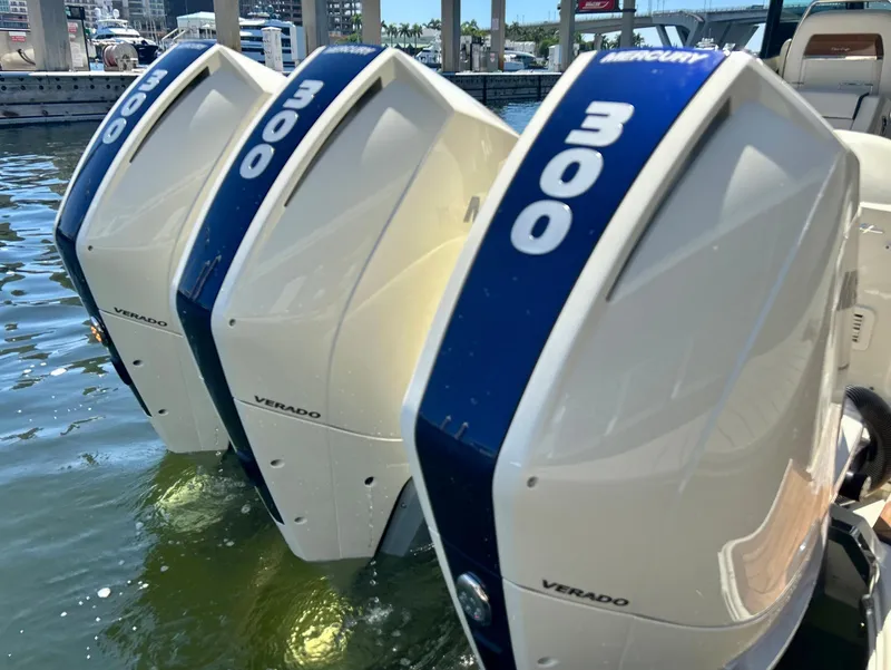 Slide: The Image of Triple Mercury Verado 300 outboard engines on a 2023 Chris-Craft 35 Calypso boat. - 7