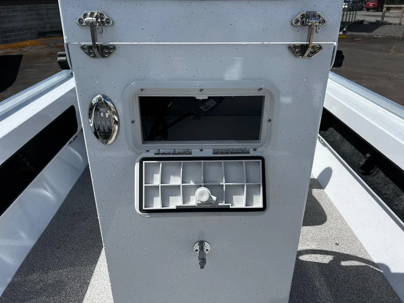 Slide: The Image of 2024 Fish Rite Angler 18 boat interior with seating and storage compartments. - 10