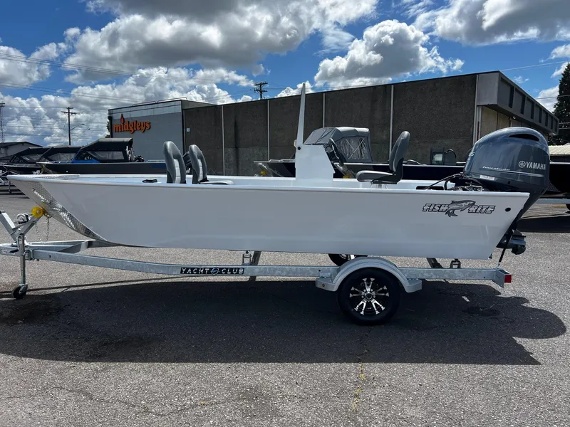 Slide: The Image of 2024 Fish Rite Angler 18 boat with Suzuki 40 engine, parked outdoors. - 3