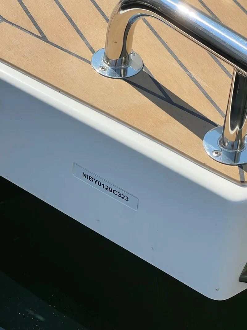 Slide: The Image of 2023 Nimbus C9 boat with visible hull identification number (HIN) NIBY0129C323. - 18