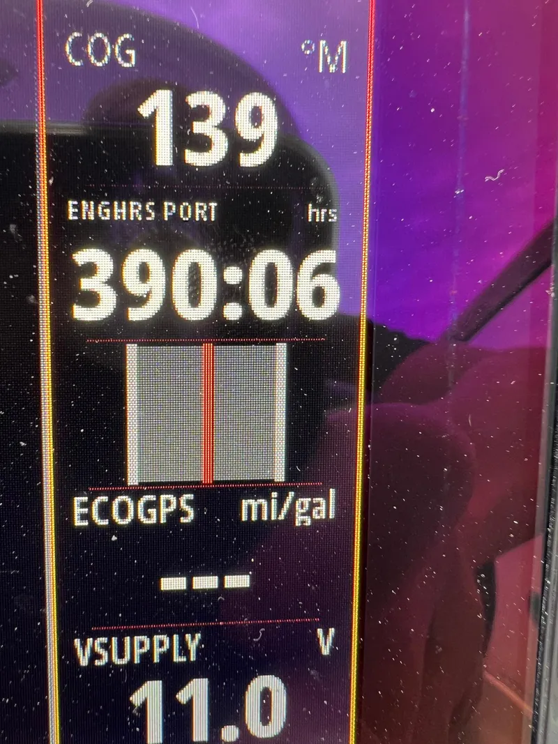 Slide: The Image of Digital display showing engine hours, speed, and voltage on a 2007 Formula 310SS boat. - 7
