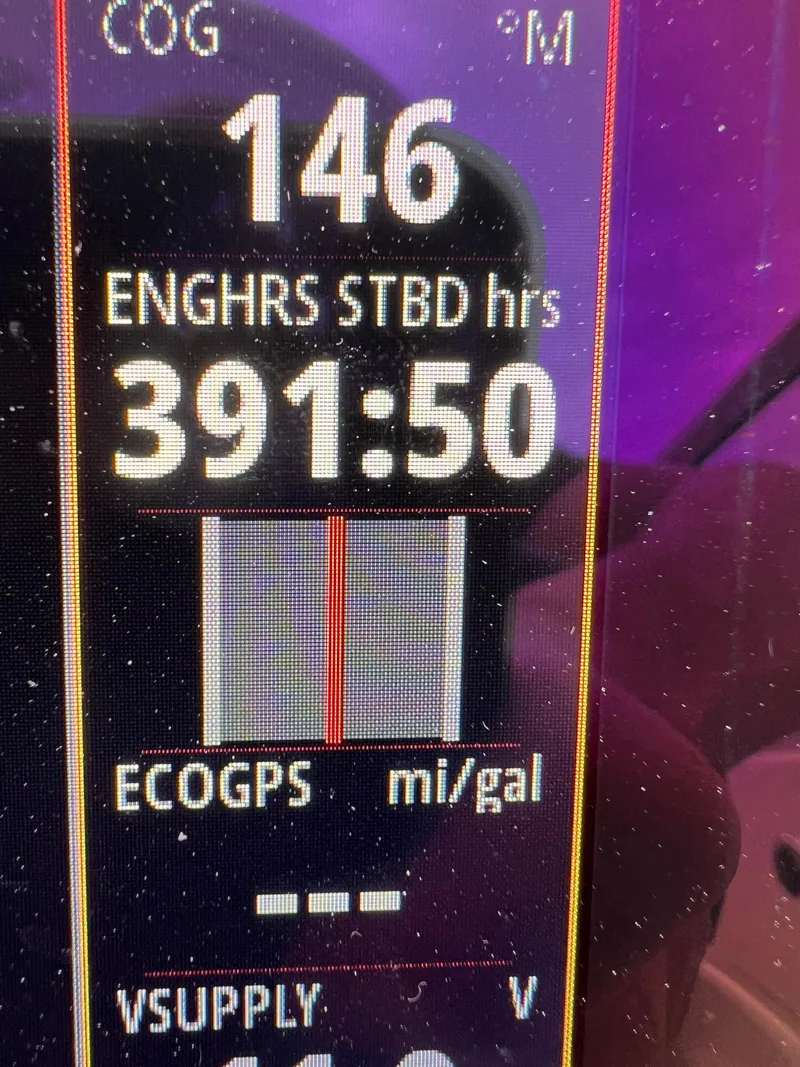 Slide: The Image of Digital display showing engine hours and speed for a 2007 Formula 310SS boat. - 8