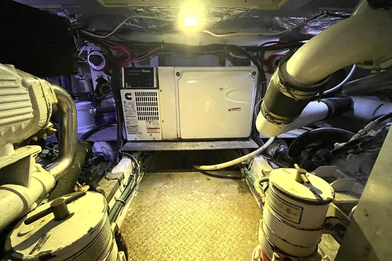 Slide: The Image of Engine room of a 1972 Hatteras 42 Convertible boat with Cummins generator. - 29