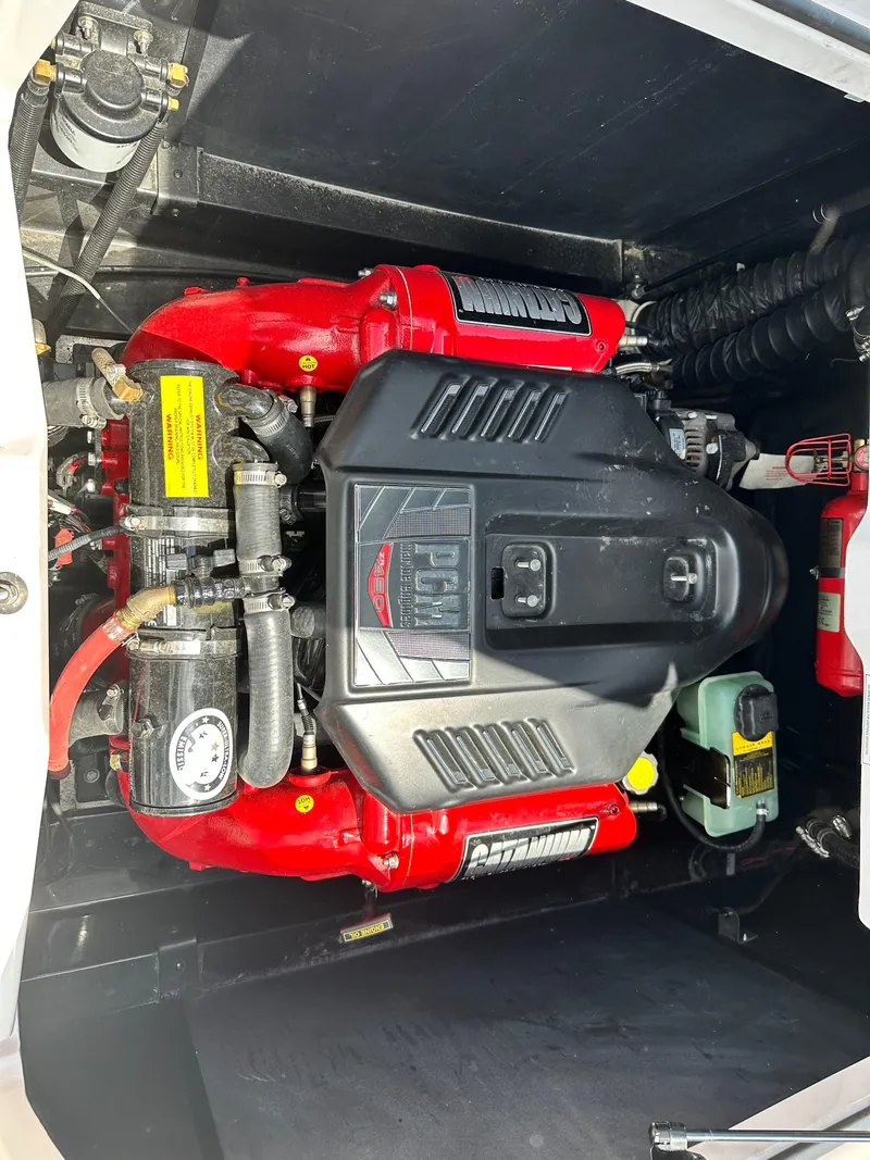 Slide: The Image of 2014 Nautique G25 boat engine compartment with PCM engine. - 11