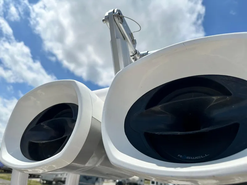 Slide: The Image of Close-up of 2014 Nautique G25 boat speakers against a blue sky. - 13
