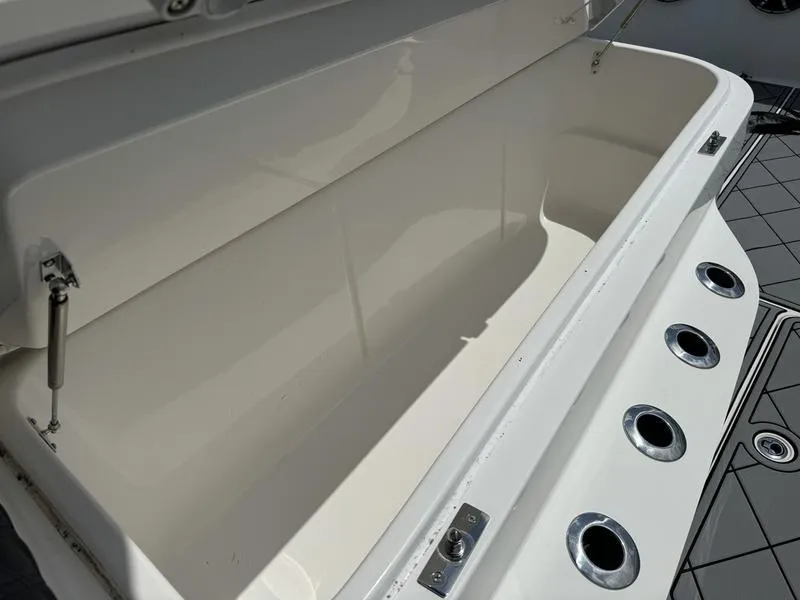 Slide: The Image of Open storage compartment on 2022 Invincible 46' Catamaran. - 30