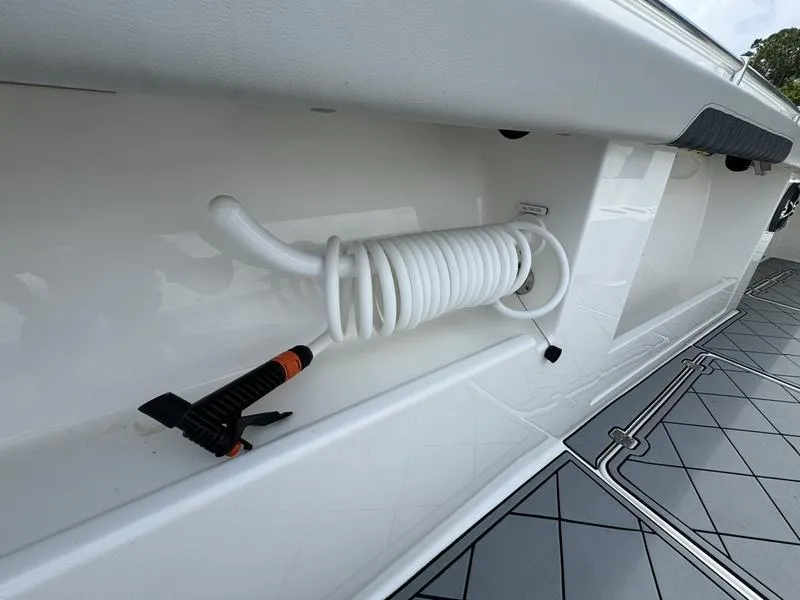 Slide: The Image of Coiled hose on 2022 Invincible 46' Catamaran deck. - 33