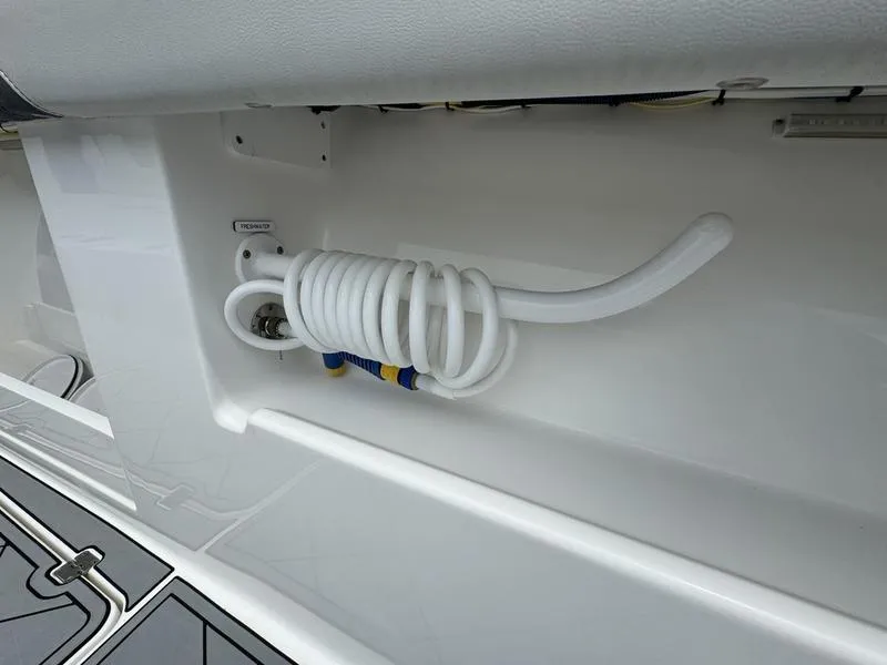 Slide: The Image of Coiled hose on 2022 Invincible 46' Catamaran deck. - 34