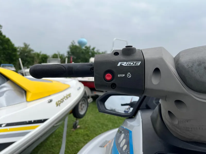 Slide: The Image of Close-up of 2015 Yamaha WaveRunner VX Deluxe handlebar with stop button. - 6
