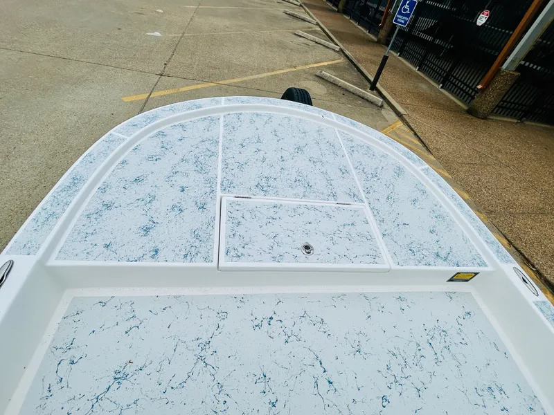 Slide: The Image of 2024 Shallow Sport 18 Sport boat deck with non-slip surface. - 13