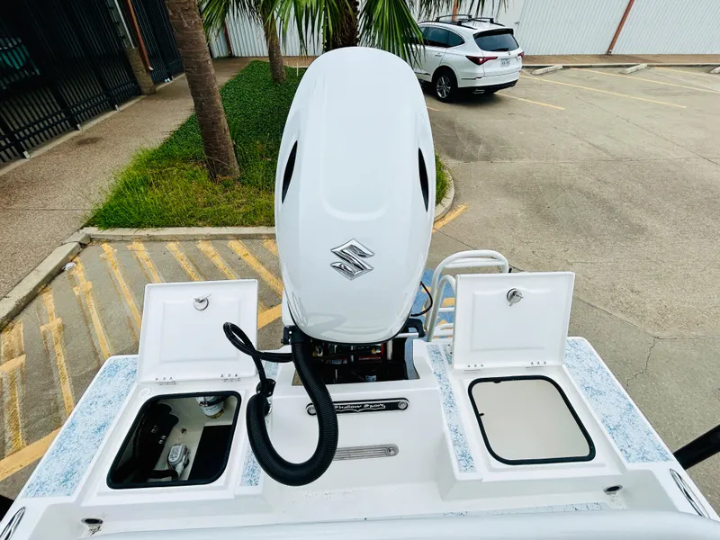 Slide: The Image of 2024 Shallow Sport 18 Sport boat with Suzuki outboard motor. - 7