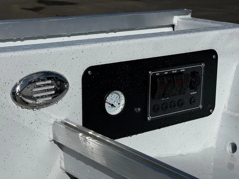 Slide: The Image of Control panel of the 2024 Fish Rite Angler 18 boat. - 10