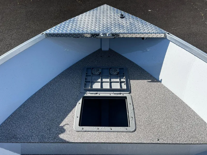 Slide: The Image of 2024 Fish Rite Angler 18 boat bow with storage compartments. - 17